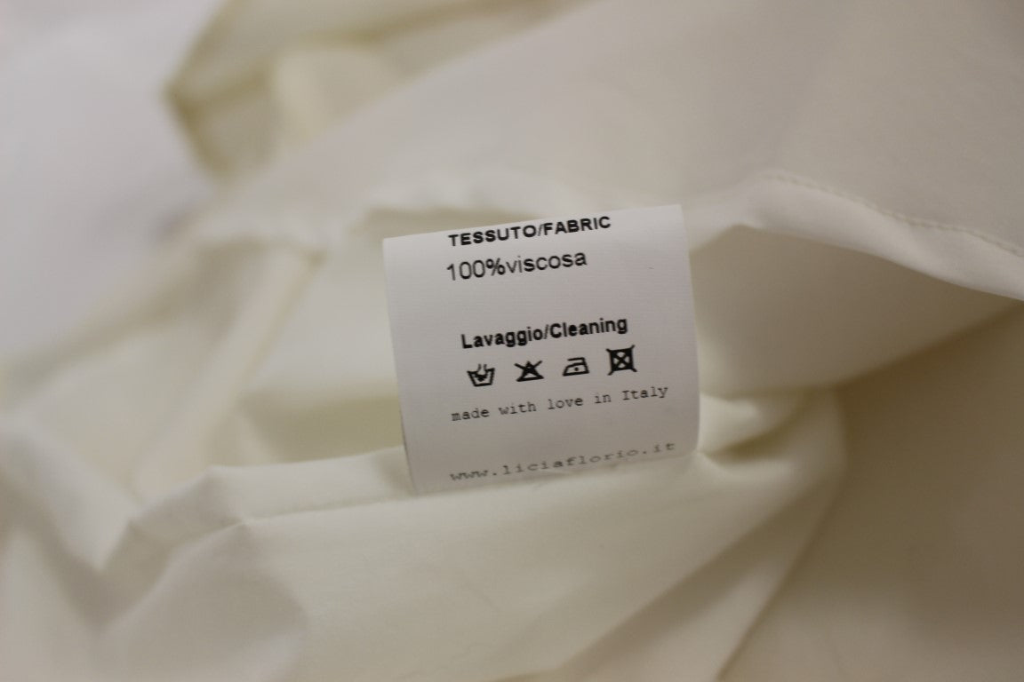 Licia Florio White Halterneck Knee Length Tea Dress $672.00 Licia Florio Luzworld