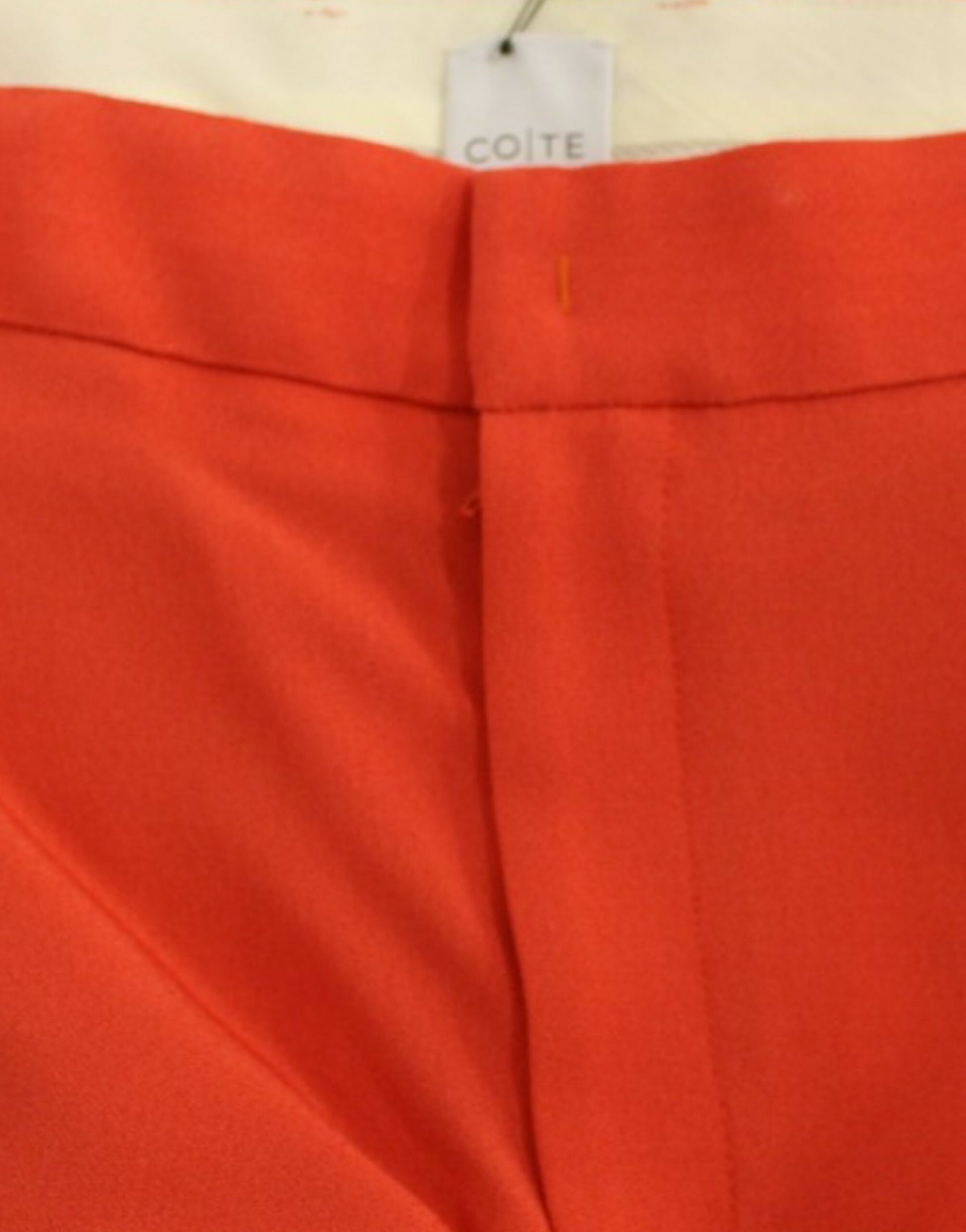 CO|TE Orange boyfriend stretch pants $725.00 CO|TE Luzworld