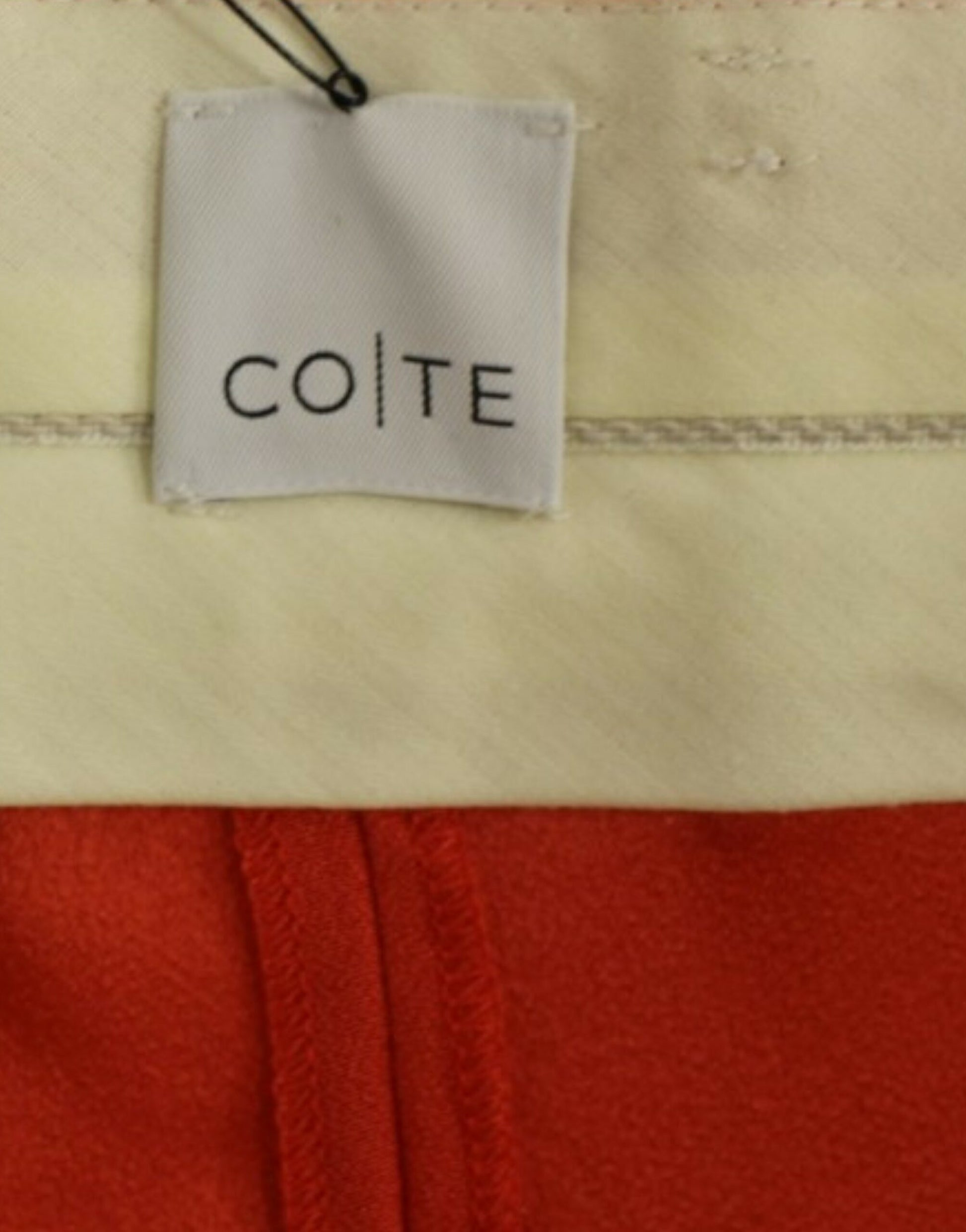 CO|TE Orange boyfriend stretch pants $725.00 CO|TE Luzworld
