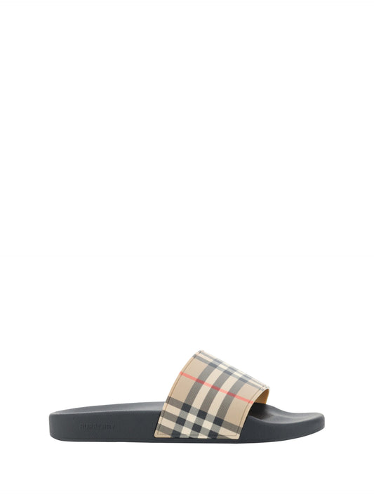Burberry Brown Rubber Slides Sandals $669.00 Burberry Luzworld