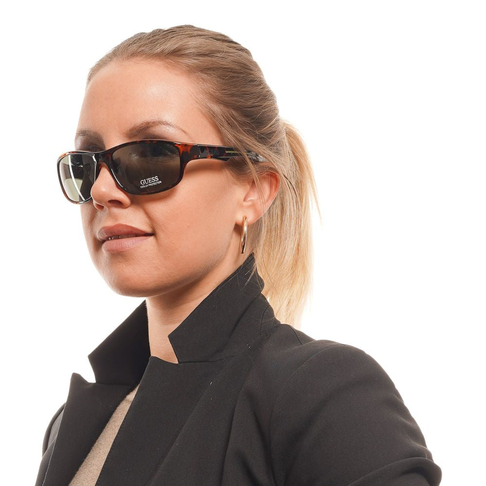 Guess Brown Unisex Sunglass $190.00 Guess Luzworld