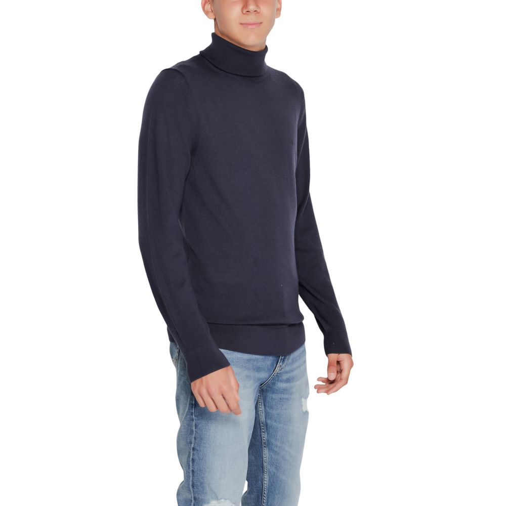 Calvin Klein Blue Wool Turtleneck $251.00 Calvin Klein Luzworld