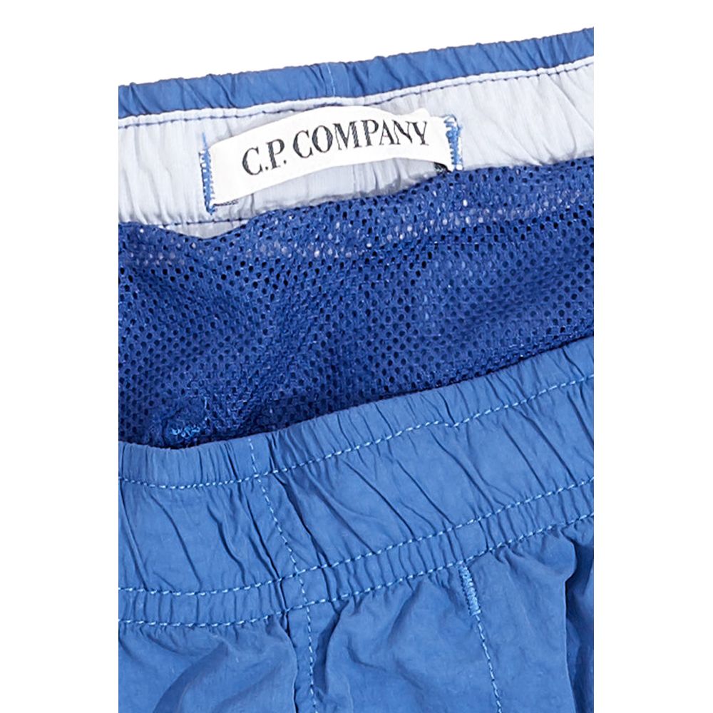 C.P. Company Sleek Blue Swimwear For The Modern Man $220.00 C.P. Company Luzworld