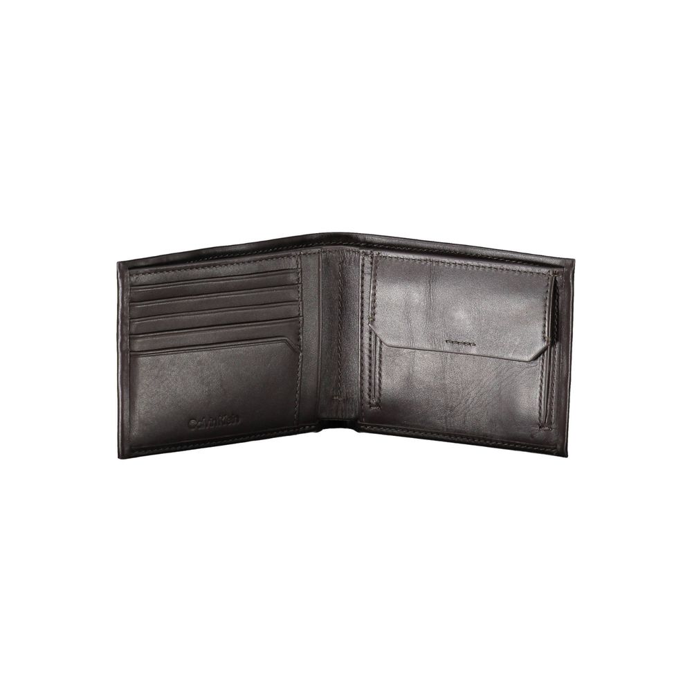 Calvin Klein Elegant Leather Dual-Compartment Wallet $193.00 Calvin Klein Luzworld