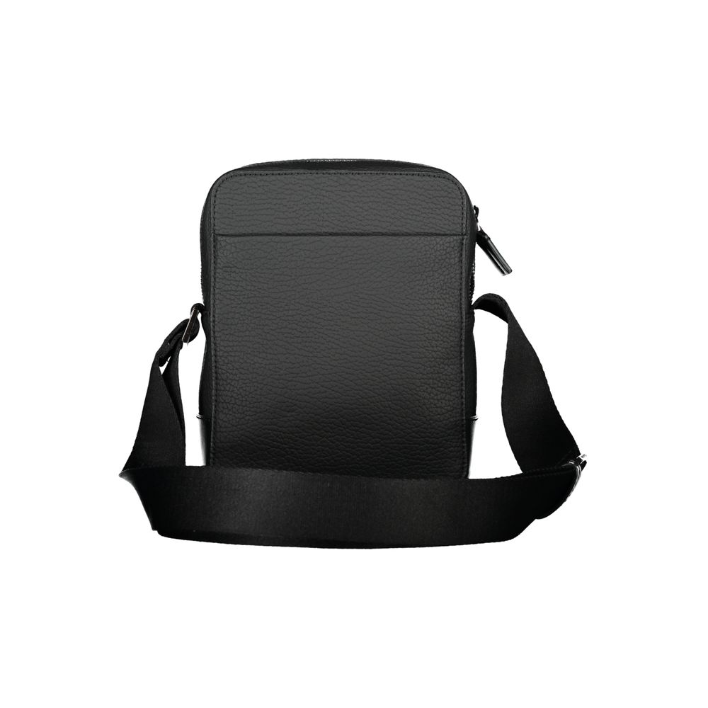Calvin Klein Sleek Black Shoulder Bag with Contrasting Details $233.00 Calvin Klein Luzworld