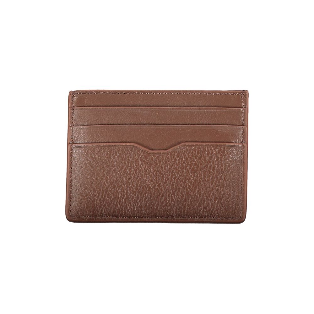 Tommy Hilfiger Sleek Leather Card Holder with Contrast Detailing $154.00 Tommy Hilfiger Luzworld