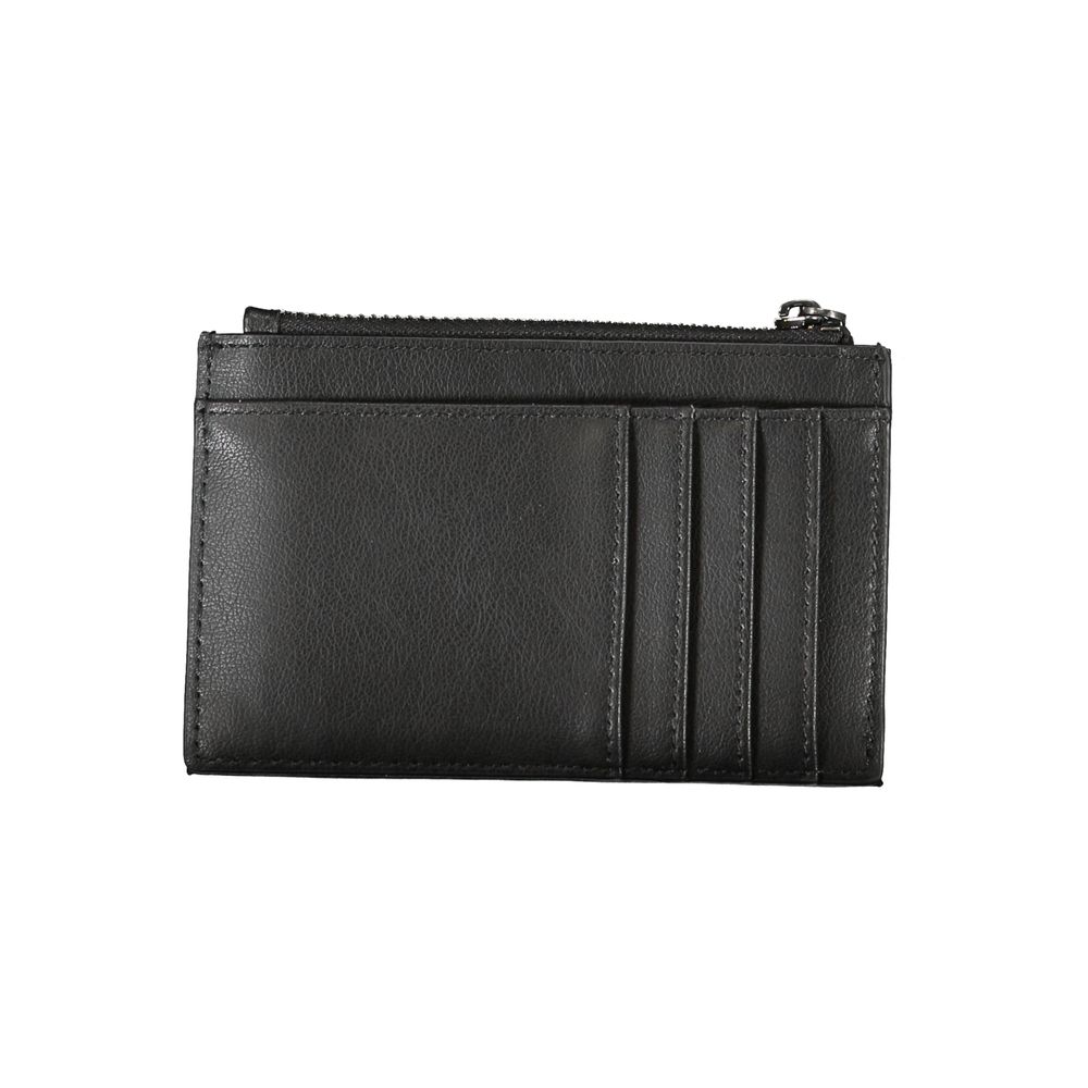 Calvin Klein Sleek Black Zip Wallet with Contrast Detailing $159.00 Calvin Klein Luzworld