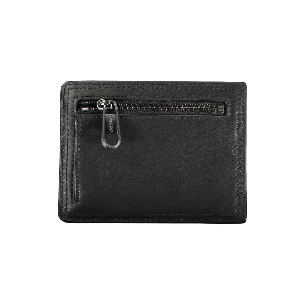 Calvin Klein Sleek Black Leather Coin Purse with Card Holder $177.00 Calvin Klein Luzworld