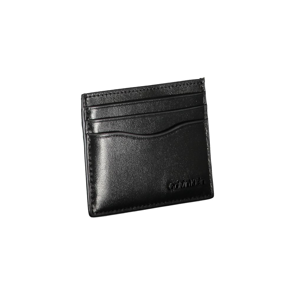 Calvin Klein Sleek Black Leather Card Holder $152.00 Calvin Klein Luzworld