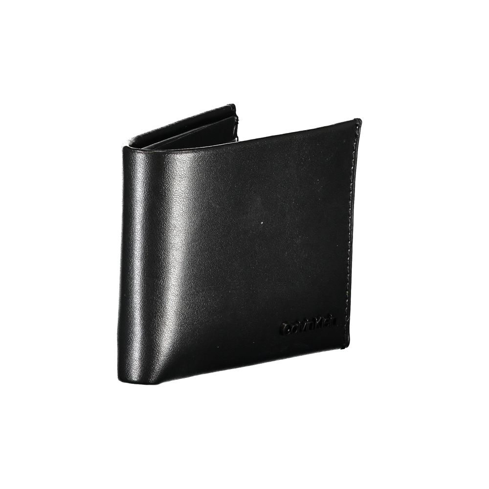 Calvin Klein Black Leather Wallet $200.00 Calvin Klein Luzworld