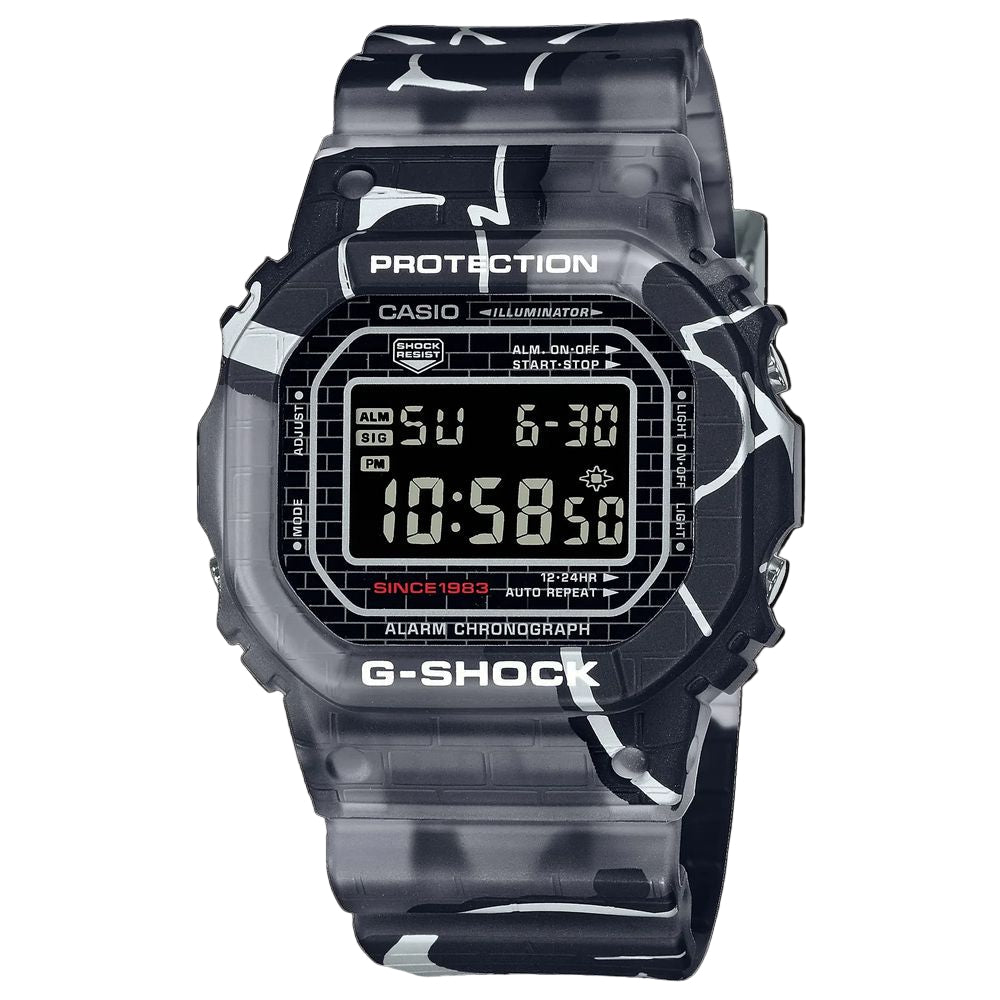G-Shock digital watch with clear black and white patterned strap on a black background