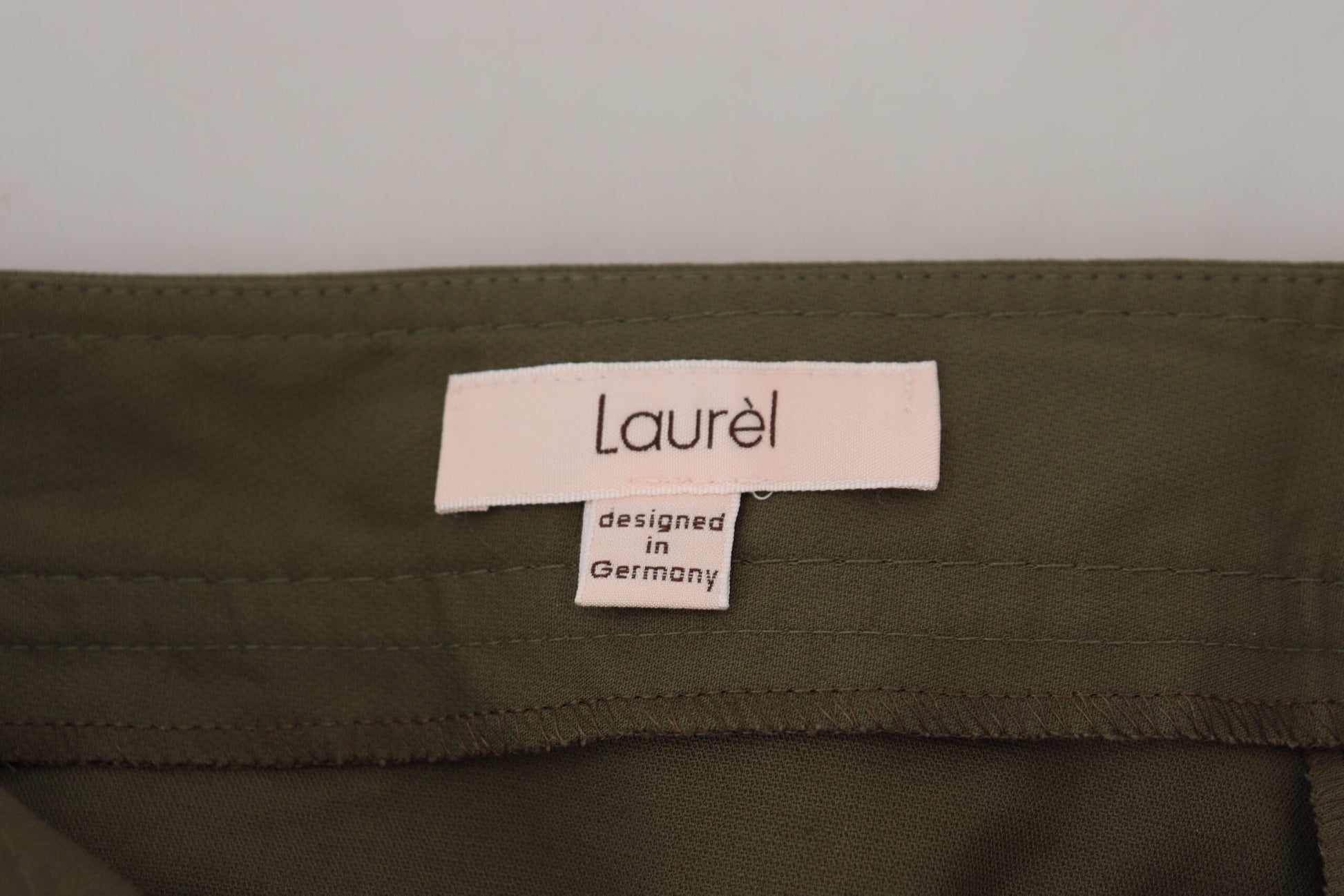 LAUREL Green Cotton High Waist Women Tapered Pants $559.00 LAUREL Luzworld
