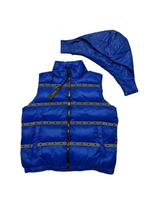 Blue puffer vest and hat set on a white background