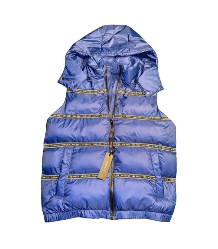 Blue puffer vest with a hood on a white background