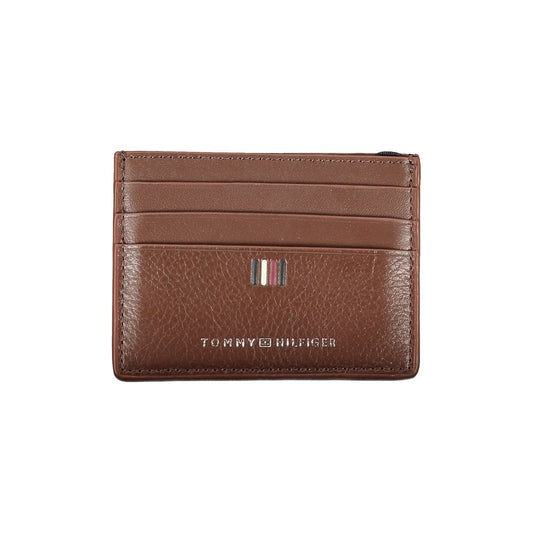 Brown leather cardholder with Tommy Hilfiger logo on a white background