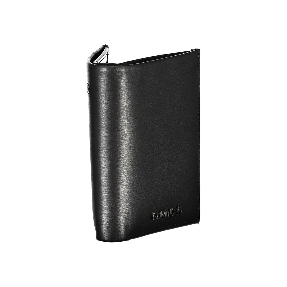 Calvin Klein Sleek Black Leather RFID Wallet $200.00 Calvin Klein Luzworld
