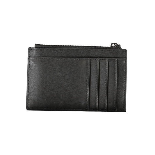 Calvin Klein Sleek Black Zip Wallet with Contrast Detailing $159.00 Calvin Klein Luzworld
