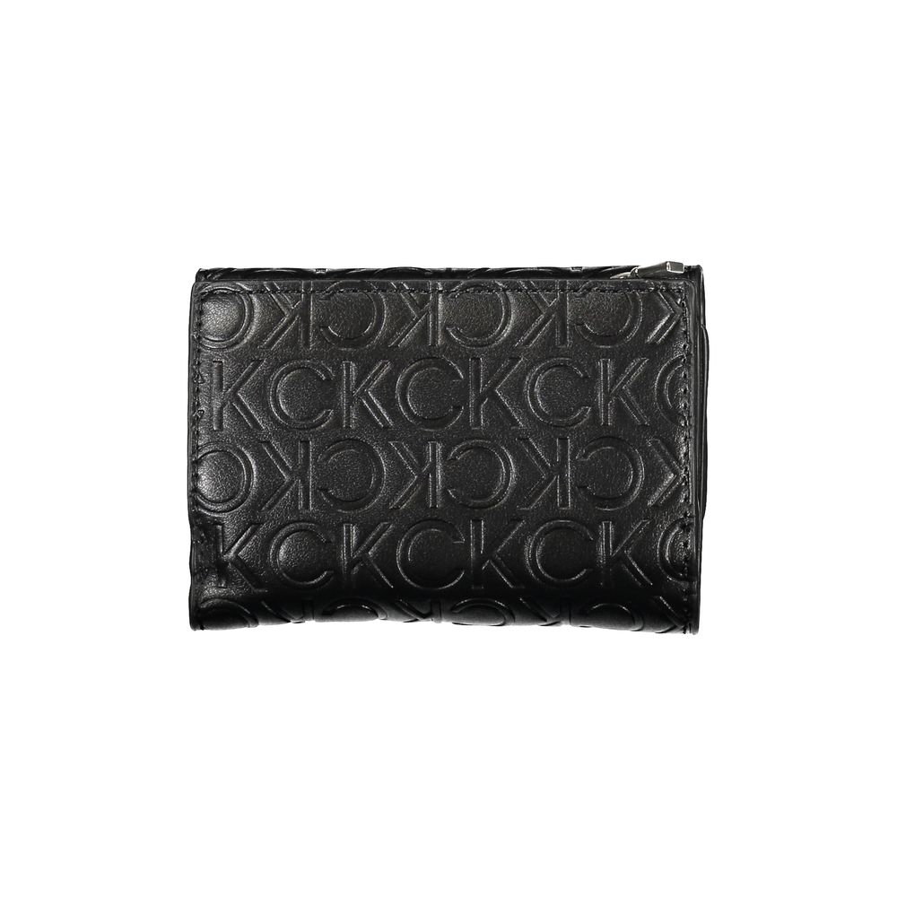 Calvin Klein Sleek Black Double-Compartment Wallet $186.00 Calvin Klein Luzworld