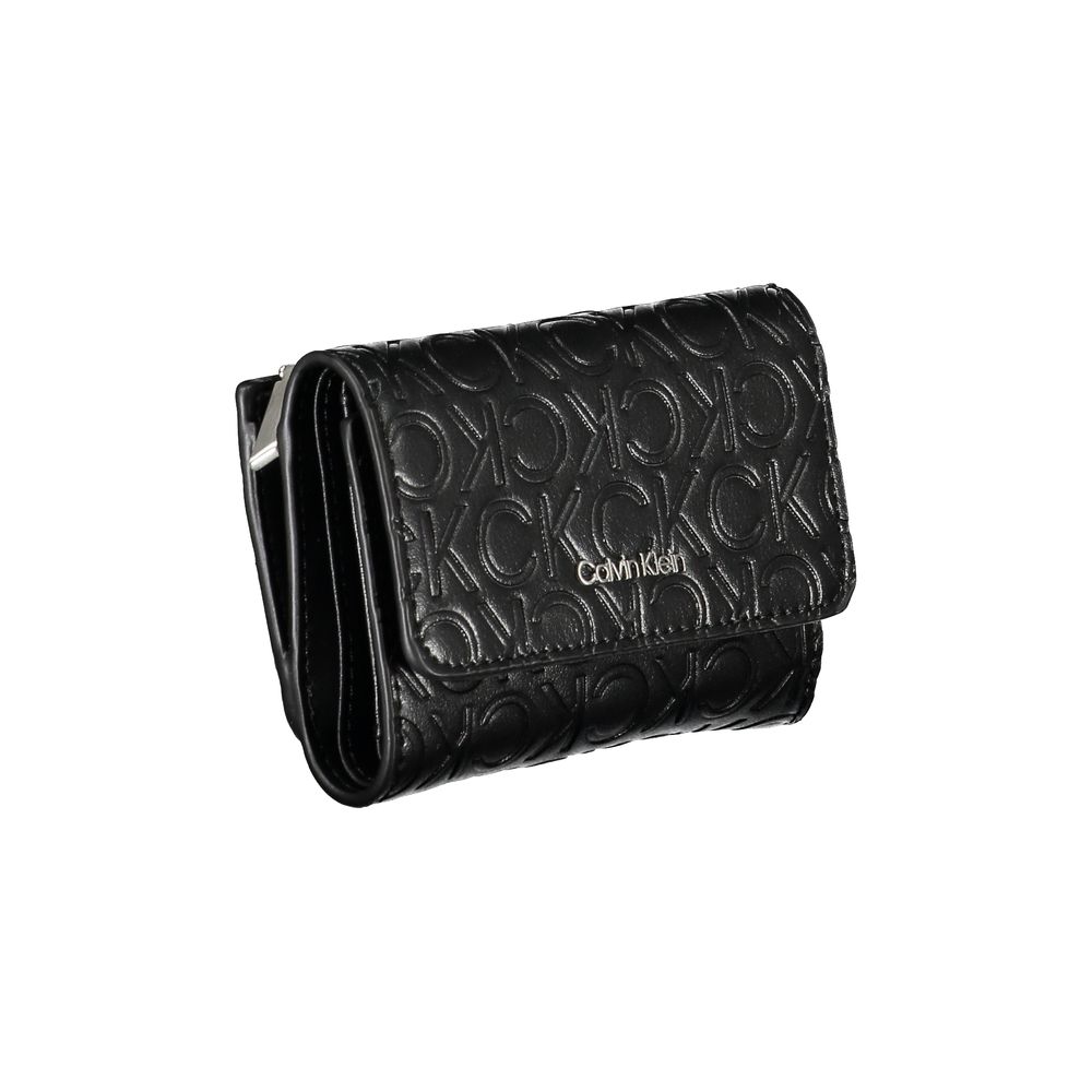 Calvin Klein Sleek Black Double-Compartment Wallet $186.00 Calvin Klein Luzworld