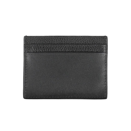 Calvin Klein Elegant Leather Card Holder in Timeless Black $152.00 Calvin Klein Luzworld