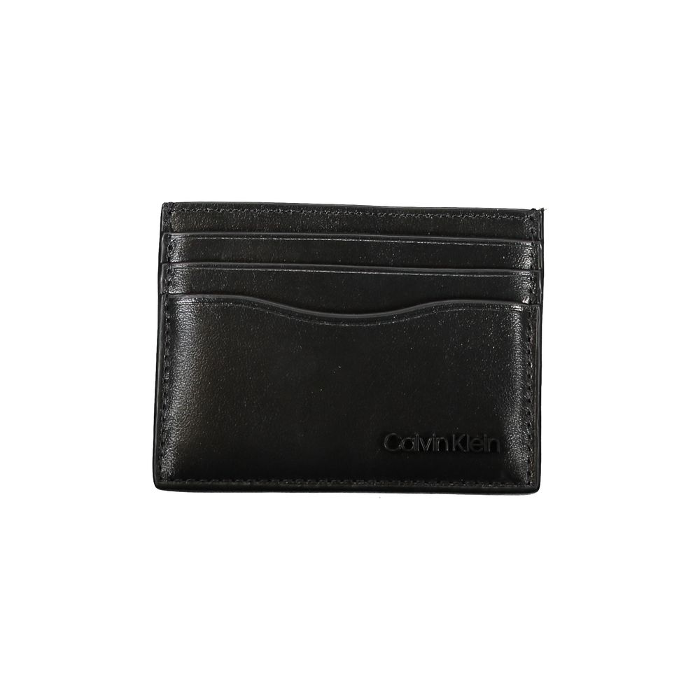 Calvin Klein Sleek Black Leather Card Holder $152.00 Calvin Klein Luzworld