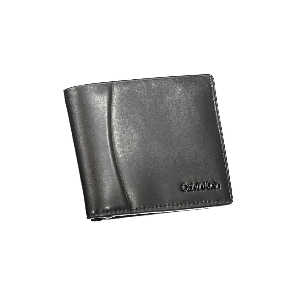 Calvin Klein Black Leather Wallet $200.00 Calvin Klein Luzworld