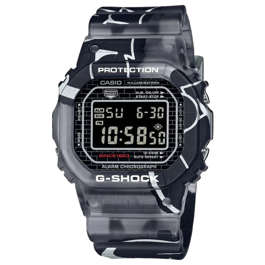 G-Shock digital watch with clear black and white patterned strap on a black background